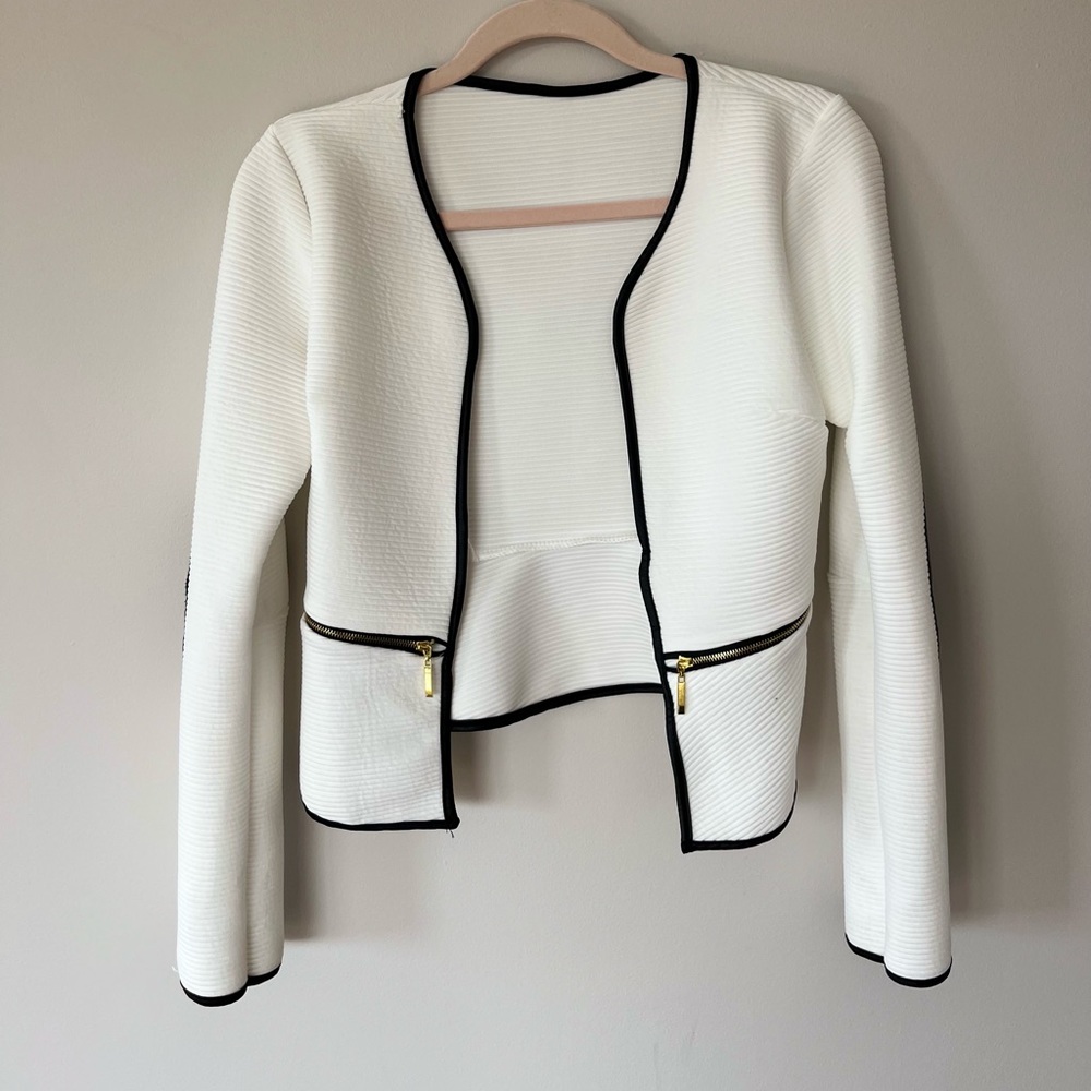 White Blazer with Black accents and faux leather on the elbows